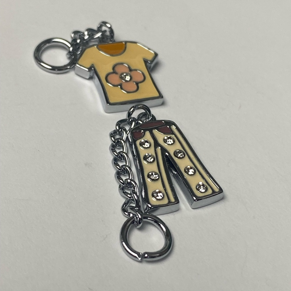 🎈Sale 🎈2 for $10 cute charm outfit this counts as one $10 choice phone purse